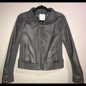 Leather jacket with knitted sides
